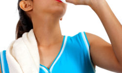 Thirsty Girl Drinking Water After Exercise